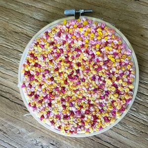 Vintage embroidery hoop with handmade French knots